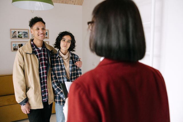 three people meeting inside a room